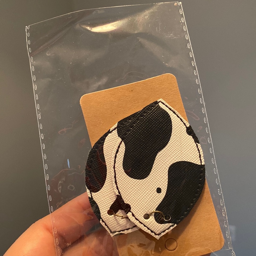 Cow print dangly earrings